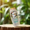 Gel de ducha Lovea aroma coco sobre un tronco
