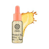 Frasco del sérum facial C-Berrica junto a bayas de espino amarillo