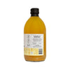 Reverso de la botella de vinagre de manzana Manare con uso sugerido y código de barras