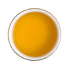 Taza con infusión de manzanilla Basilur preparada